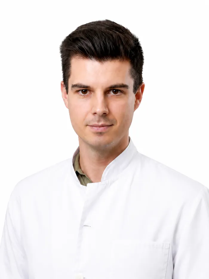 Dr. Vlad Tau